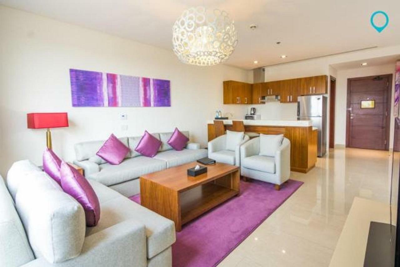 Somewhere Hotel Al Ahsa Al-Hofuf Esterno foto A living room in a serviced apartment in Dubai, United Arab Emirates